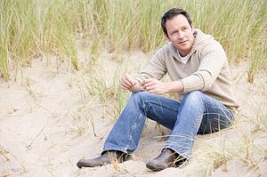 Man sitting on beach
