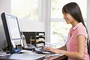 Teenage Girl Using Desktop Computer 