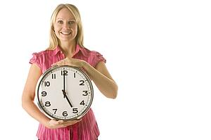 Woman Holding Clock
