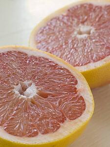 Halved pink grapefruit