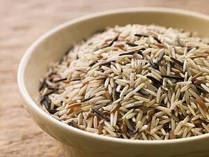 Bowl of Uncooked Wild, Basmati and Red Carmague Rice