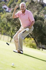 Man Playing A Game Of Golf