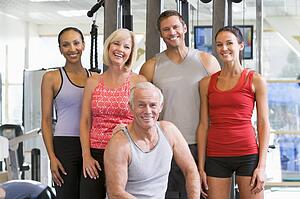 Portrait Of Men And Women At The Gym