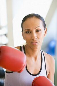 Woman Boxing At Gym