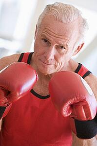 Man Boxing At Gym