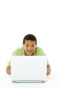 Portrait Of Teenage Boy On His Laptop