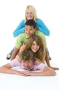 Teenagers On Top Of One Another