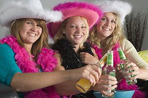 Dressed Up Teenage Girls Enjoying Drinks