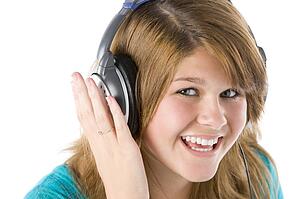 Teenage Girl Listening To Music