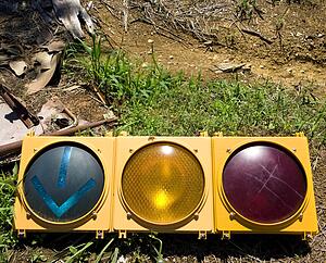 Old traffic light on ground