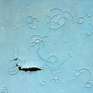 Cracked and weathered blue seat covering