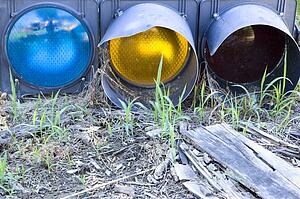 Old traffic light on ground.