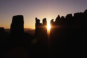 Scenic sunset landscape of mesas in Monument Valley near the border of Arizona and Utah, United States.