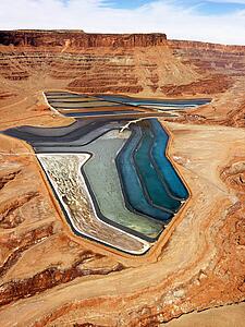 Aerial landscape of tailing ponds for mineral waste in rural Utah, United States