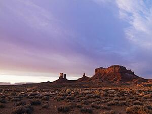 Scenic landscape at dusk of mesas in Monument Valley near the border of Arizona and Utah
