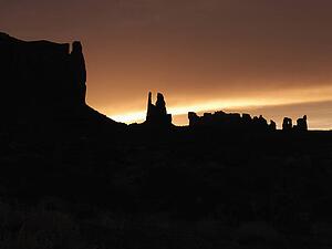 Scenic sunset landscape of mesas in Monument Valley near the border of Arizona and Utah, United States.