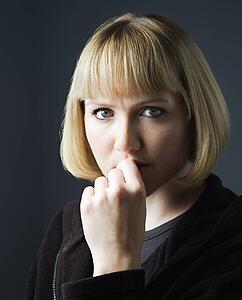 Young woman looking contemplative