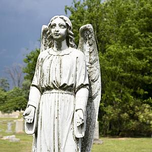Guardian Angel statue in graveyard