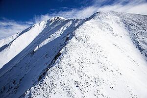 Aerial scenic of snowy Sangre De Cristo Mountains, Colorado, United States in winter.