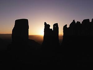 Scenic sunset landscape of mesas in Monument Valley near the border of Arizona and Utah, United States