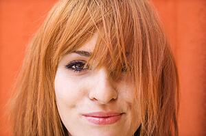 Redheaded woman with funny expression