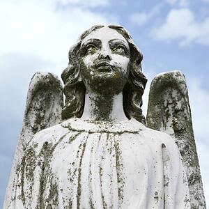 Guardian Angel statue in graveyard