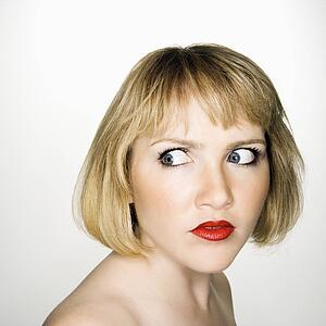 Woman who has suspicious expression