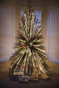 Motion blurred radial abstract Christmas tree lights.