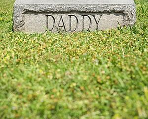 Gravestone marker with word 'Daddy' 