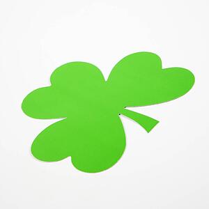 Single green paper shamrock on white