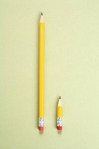 One long pencil and one short pencil placed side by side in comparison