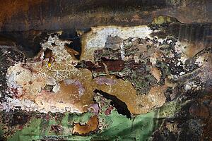 Close-up detail of old abandoned and rusted car