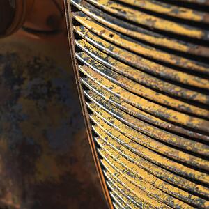 Close-up of radiator grill of rusty old pick-up truck