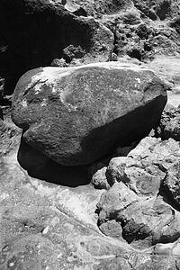 Large rock on rock cliff in Maui, Hawaii