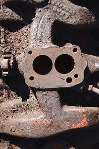Close-up of old dirty car part