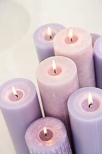 Close up of lit lavender candles