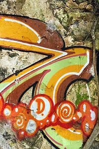 Concrete wall covered with graffiti