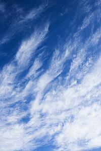 Beautiful blue sky with light wispy clouds