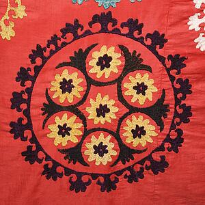Asian pattern on red textile fabric