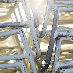 Close-up of stacked worn beach chairs in Miami, Florida, USA