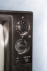 Close-up of old television set control panel