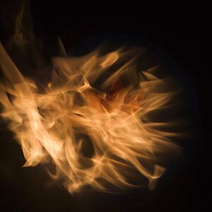 Circle of flames enveloping a single Maple leaf