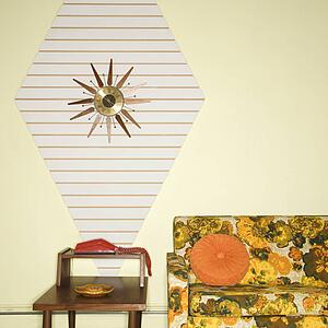 Room decorated with colorful retro furniture.