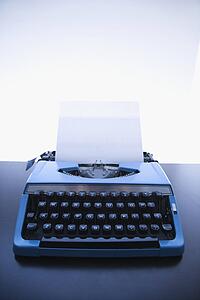 Blank sheet of paper in a typewriter