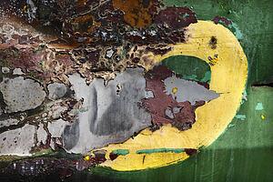 Close-up of old abandoned and rusted car