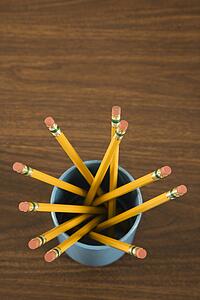 Bird's eye view of wooden pencils in cup