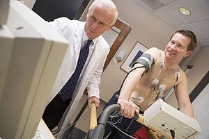 Doctor Monitoring Patient During Health Check