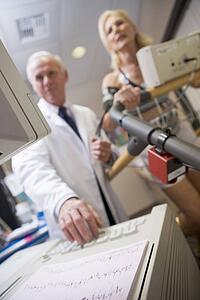 Doctor With Patient During Health Check