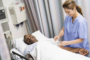 Nurse Caring For Patient