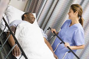 Nurse Caring For Patient